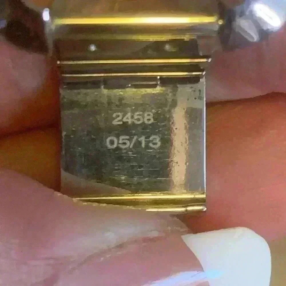 Gucci G watch Silver with Dark Bronze Face With Diamonds.